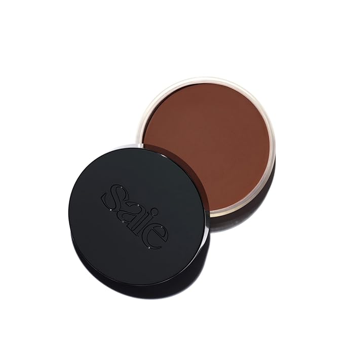 Saie Sun Melt Cream Bronzer - Buildable Balm Face Bronzer for Effortless Sculpting - Cream Contour Enriched with Vitamin C, Nourishing Skincare Ingredients & a Natural Finish - Deep Bronze (1 oz)